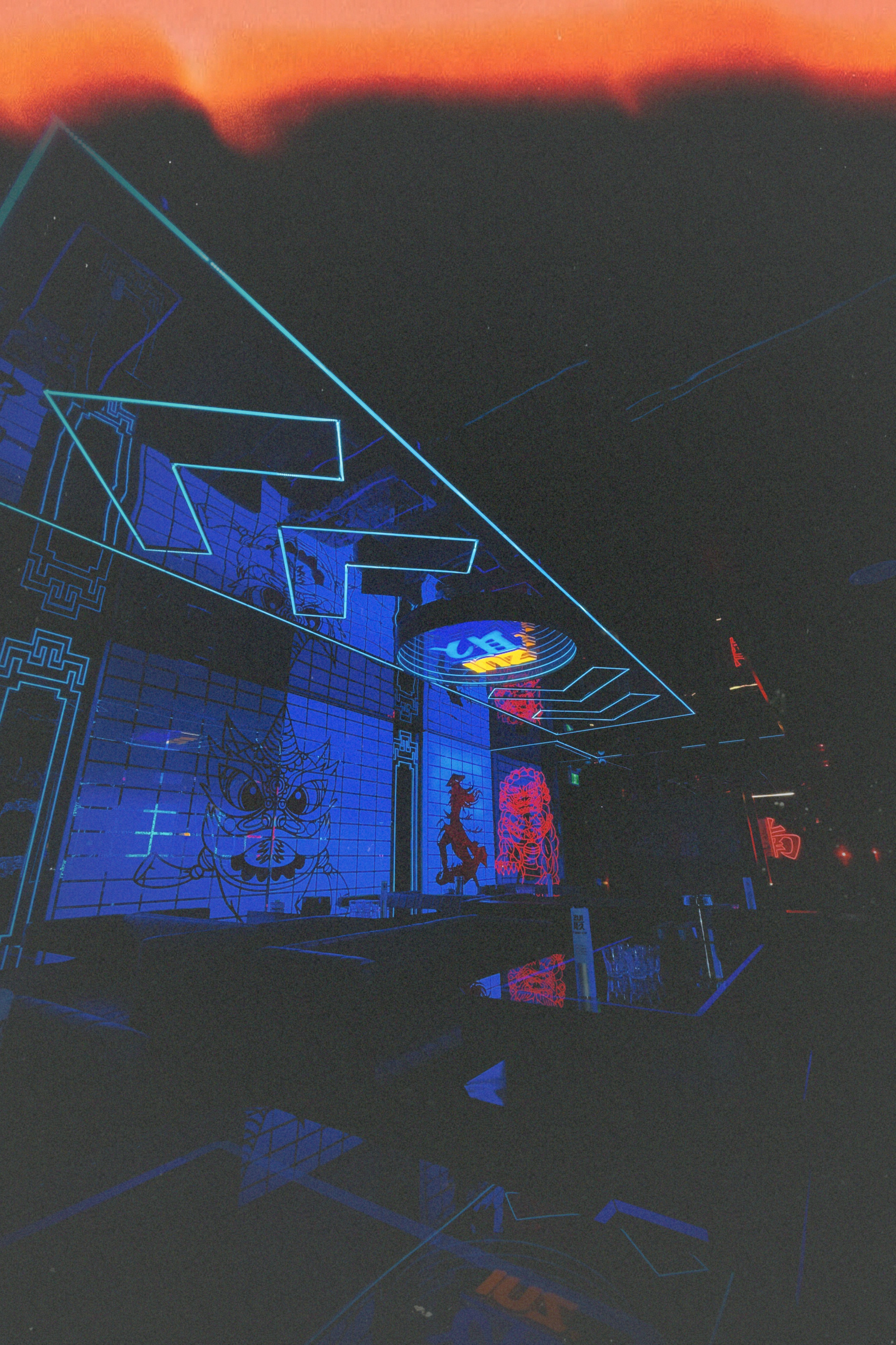 Neon storefront with heavy analog color cast